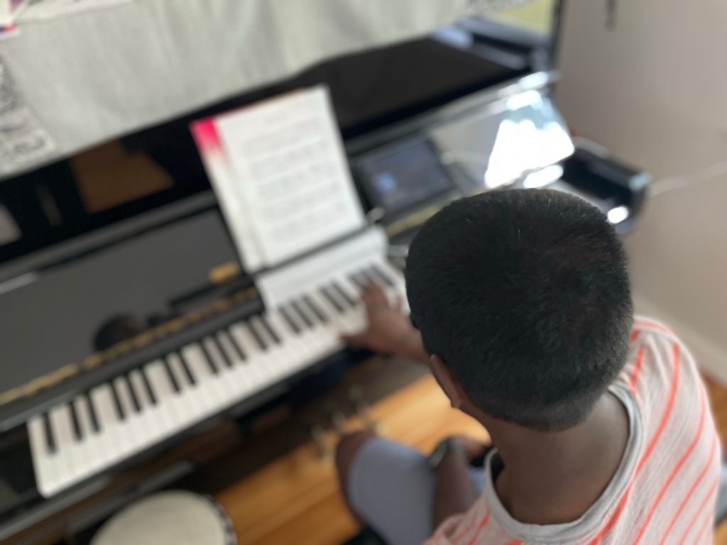 My son at the piano